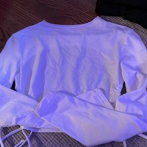White long sleeve crop top with open back